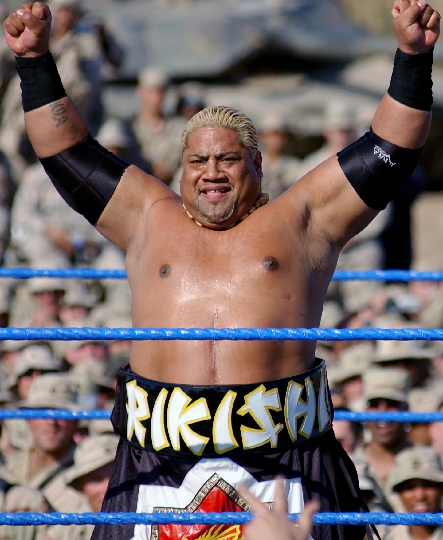 World Wrestling Entertainment (WWE) superstar Rikishi performs for the troops at Camp Victory, Baghdad International Airport (BIAP), Iraq (IRQ) during Operation IRAQI FREEDOM.