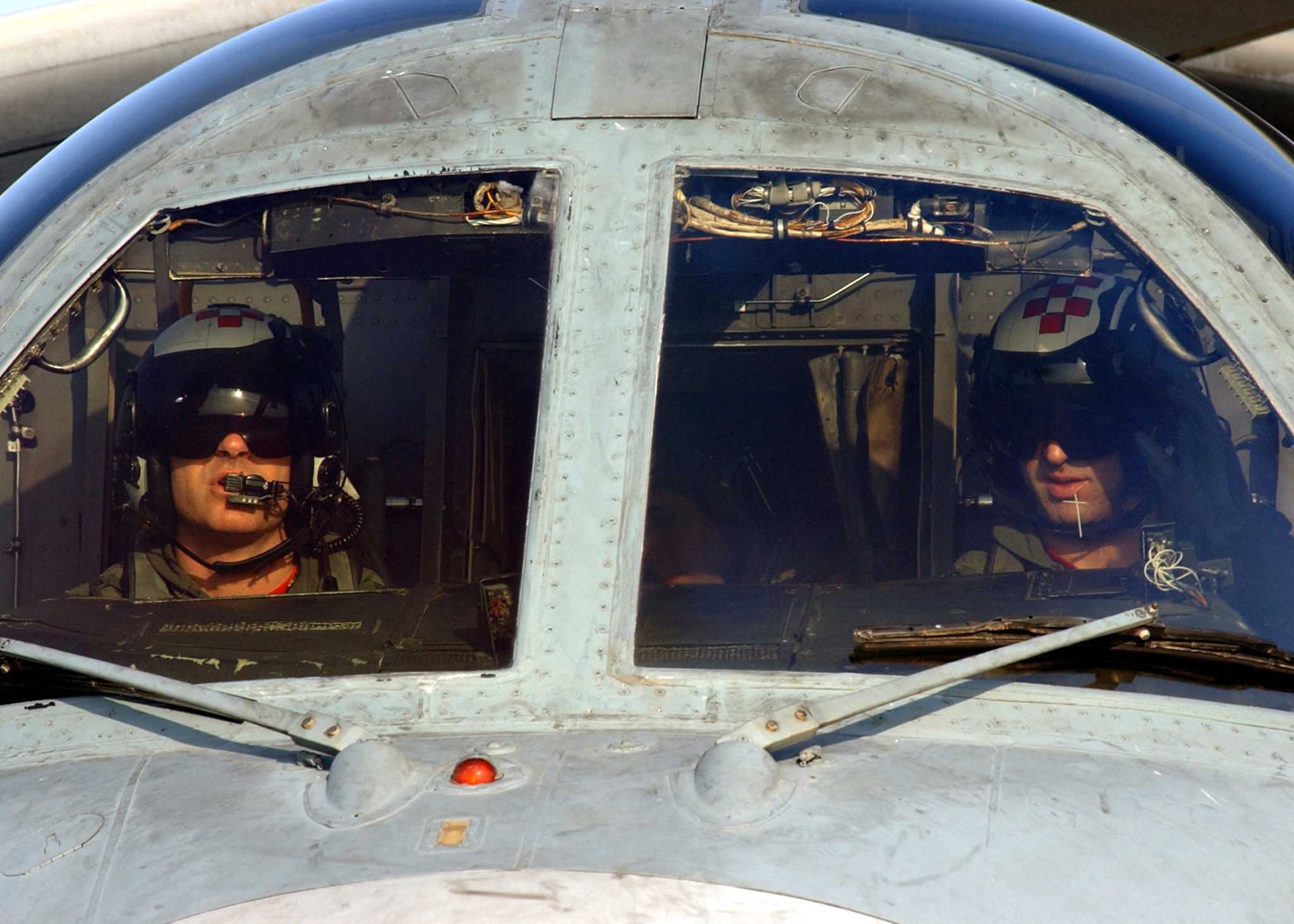 041226-N-2984R-014 Persian Gulf (Dec. 26, 2004) - Two pilots assigned to the ÒCheckmatesÓ of Sea Control Squadron Two Two (VS-22), conduct start-up procedures before launching off the flight deck aboard the Nimitz-class aircraft carrier USS Harry S. Truman (CVN 75). Carrier Air Wing Three (CVW-3) embarked aboard Truman is providing close air support and conducting intelligence, surveillance and reconnaissance missions over Iraq. The Truman Strike Group is on a regularly scheduled deployment in support of the Global War on Terrorism. U.S. Navy photo by PhotographerÕs Mate Airman Apprentice Ricardo J. Reyes (RELEASED)
